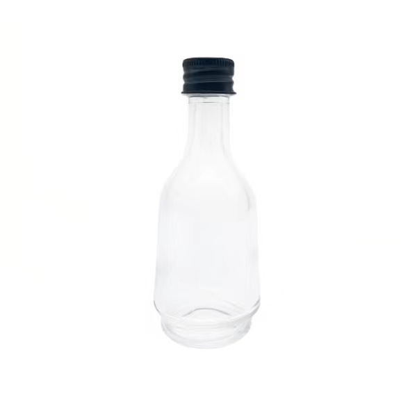 Petites bouteilles en verre clair avec couvercles 3